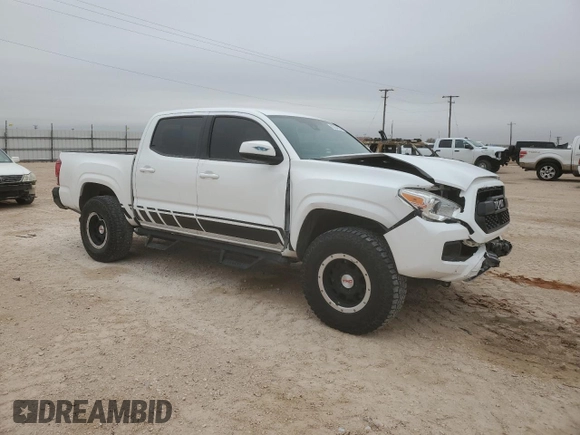 2018 Toyota Tacoma SR with VIN 3TMCZ5AN4JM143350, listed as a Copart auction lot 83234524 with 70,853 mi miles and Clean Title. Bid and sale history available at DreamBid. Image 4.