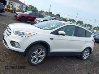 2019 Ford Escape Titanium with VIN 1FMCU9J97KUA03195, listed as a IAAI auction lot 42656589 with 40,099 mi miles and . Bid and sale history available at DreamBid. Image 14.