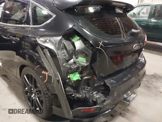 2014 Ford Focus ST with VIN 1FADP3L96EL355713, listed as a IAAI auction lot 41572939 with 102,838 mi miles and . Bid and sale history available at carsss.com. Image 6.