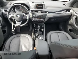 2016 BMW X1 xDrive28i z VIN WBXHT3C37GP888364, wystawiony jako Copart lot #53644975 z przebiegiem 119 725 mil mil oraz Szkoda całkowita • Salvage title. Historia ofert i sprzedaży dostępna na DreamBid. Obrazek 8.