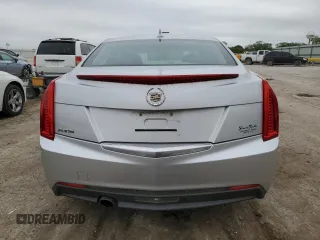 2013 Cadillac ATS z VIN 1G6AA5RAXD0140219, wystawiony jako Copart lot #53788495 z przebiegiem 149 556 mil mil oraz Szkody całkowita. Historia ofert i sprzedaży dostępna na DreamBid. Obrazek 6.
