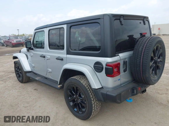 2023 Jeep Wrangler Sahara with VIN 1C4JJXP62PW627455, listed as a IAAI auction lot 42115137 with 62,143 mi miles and . Bid and sale history available at DreamBid. Image 3.