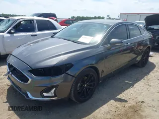 2019 Ford Fusion Titanium with VIN 3FA6P0D9XKR152617, listed as a IAAI auction lot 42209470 with 135,956 mi miles and . Bid and sale history available at DreamBid. Image 18.