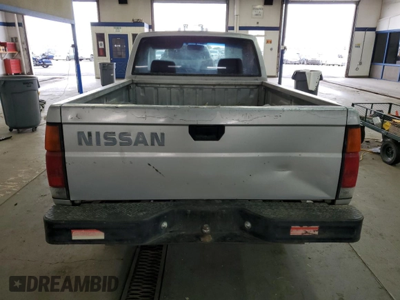 1987 Nissan Hardbody E z VIN JN6ND11S1HW006640, wystawiony jako Copart lot #78160004 z przebiegiem 403 406 mil mil oraz Szkoda całkowita • Salvage title. Historia ofert i sprzedaży dostępna na DreamBid. Obrazek 6.