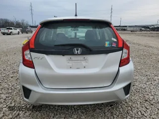 2016 Honda Fit LX with VIN JHMGK5H5XGS013874, listed as a Copart auction lot 52642085 with 73,953 mi miles and Salvage Title. Bid and sale history available at carsss.com. Image 6.