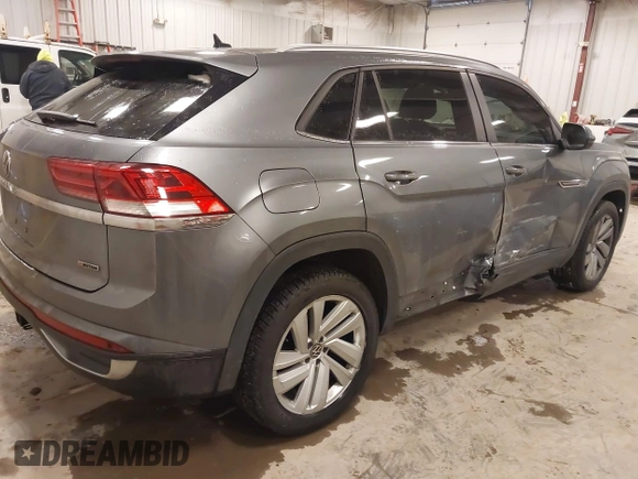 2020 Volkswagen Atlas SE with VIN 1V26E2CA9LC230374, listed as a IAAI auction lot 41336609 with 52,500 mi miles and . Bid and sale history available at DreamBid. Image 4.