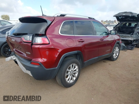 2019 Jeep Cherokee Latitude with VIN 1C4PJLCX5KD347695, listed as a IAAI auction lot 41910370 with 86,713 mi miles and . Bid and sale history available at carsss.com. Image 4.