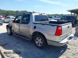 2004 Ford Explorer Sport Trac XLS z VIN 1FMZU67K34UA66302, wystawiony jako IAAI lot #42203931 z przebiegiem 221 245 mil mil oraz . Historia ofert i sprzedaży dostępna na DreamBid. Obrazek 3.