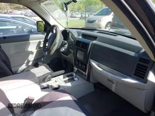 2008 Jeep Liberty Sport with VIN 1J8GP28KX8W227953, listed as a IAAI auction lot 42049588 with 310,901 mi miles. Bid and sale history available at carsss.com. Image 5.