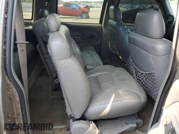 1999 Chevrolet Suburban with VIN 1GNEC16R9XJ490863, listed as a Copart auction lot 65938594 with 176,391 mi miles and Salvage Title. Bid and sale history available at carsss.com. Image 10.