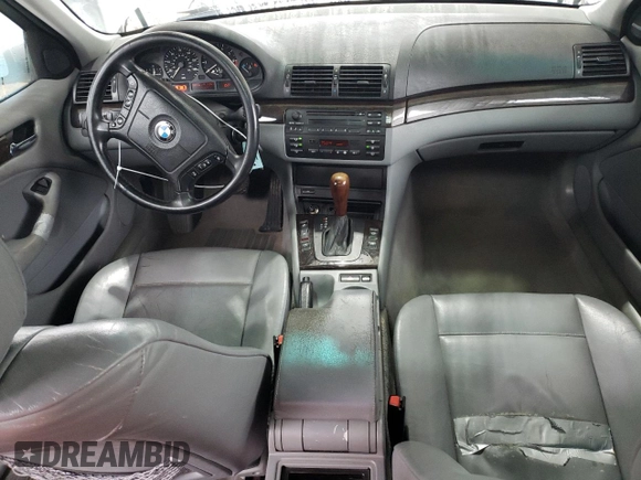 2000 BMW 3 Series 323i with VIN WBAAM3348YFP73443, listed as a Copart auction lot 54165575 with 334,761 mi miles and Salvage title. Bid and sale history available at DreamBid. Image 8.