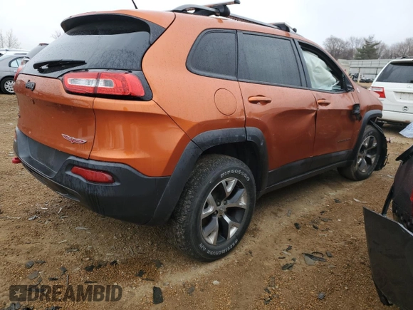 2015 Jeep Cherokee Trailhawk z VIN 1C4PJMBS7FW704980, wystawiony jako Copart lot #70334472 z przebiegiem 127 562 mil mil oraz Szkoda całkowita • Salvage title. Historia ofert i sprzedaży dostępna na DreamBid. Obrazek 3.