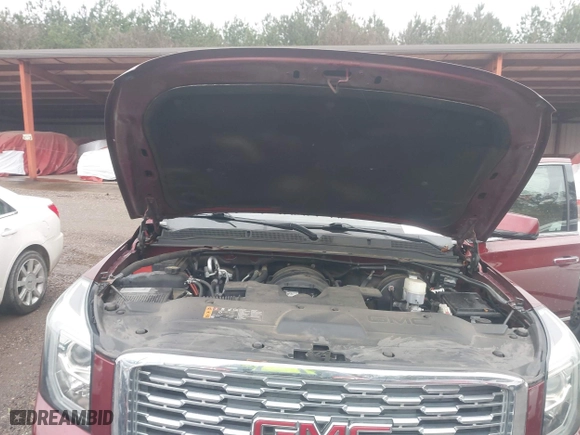 2020 GMC Yukon XL Denali with VIN 1GKS1HKJ7LR170497, listed as a IAAI auction lot 41562109 with 97,357 mi miles. Bid and sale history available at carsss.com. Image 10.
