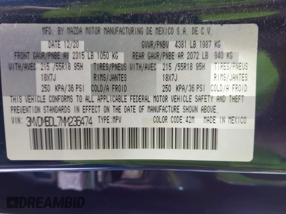 2021 Mazda CX-30 Premium z VIN 3MVDMBDL7MM236474, wystawiony jako IAAI lot #42284515 z przebiegiem 58 565 mil mil oraz . Historia ofert i sprzedaży dostępna na DreamBid. Obrazek 9.