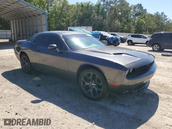 2020 Dodge Challenger SXT with VIN 2C3CDZAG7LH236117, listed as a Copart auction lot 52746765 with 75,151 mi miles and Salvage Title. Bid and sale history available at DreamBid. Image 4.