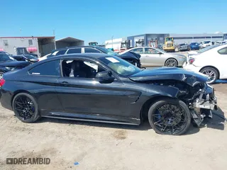 2016 BMW M4 with VIN WBS3R9C51GK708621, listed as a IAAI auction lot 41678133 with 59,501 mi miles. Bid and sale history available at carsss.com. Image 13.