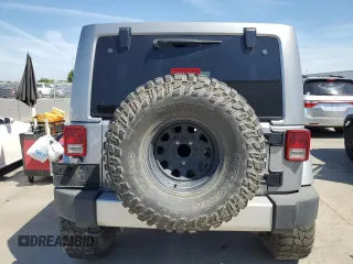 2013 Jeep Wrangler Unlimited Sahara with VIN 1C4BJWEG5DL662756, listed as a Copart auction lot 56423615 with 189,355 mi miles and Salvage title. Bid and sale history available at DreamBid. Image 6.