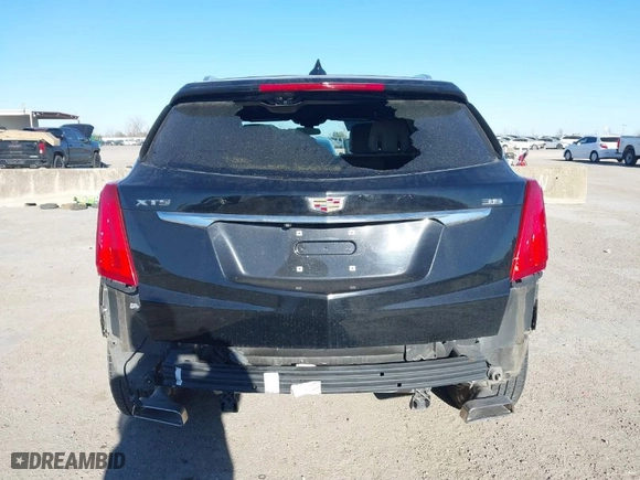 2017 Cadillac XT5 FWD with VIN 1GYKNARS3HZ122969, listed as a IAAI auction lot 41421230 with 116,603 mi miles. Bid and sale history available at carsss.com. Image 16.