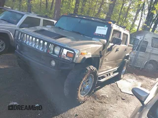 2005 Hummer H2 SUT with VIN 5GRGN22UX5H106653, listed as a IAAI auction lot 42015559 with 180,519 mi miles. Bid and sale history available at carsss.com. Image 17.