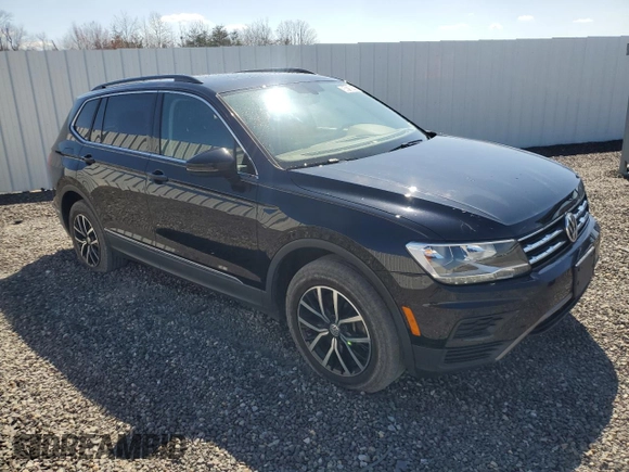 2021 Volkswagen Tiguan SE with VIN 3VV2B7AX9MM058863, listed as a Copart auction lot 50758525 with 49,298 mi miles and Clean Title. Bid and sale history available at DreamBid. Image 4.