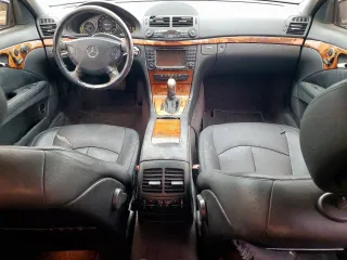 2005 Mercedes-Benz E 5.0L with VIN WDBUF70J85A668355, listed as a Copart auction lot 51750505 with 119,239 mi miles and Salvage Title. Bid and sale history available at carsss.com. Image 8.
