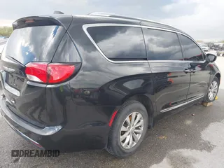 2018 Chrysler Pacifica Touring L with VIN 2C4RC1BG9JR120790, listed as a IAAI auction lot 41998460 with 124,146 mi miles and . Bid and sale history available at DreamBid. Image 4.