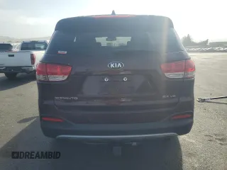 2017 Kia Sorento EX z VIN 5XYPH4A56HG290145, wystawiony jako Copart lot #59719465 z przebiegiem 79 057 mil mil oraz Szkoda całkowita • Salvage title. Historia ofert i sprzedaży dostępna na DreamBid. Obrazek 6.