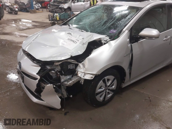 2017 Toyota Prius Two z VIN JTDKARFU1H3037959, wystawiony jako IAAI lot #41509021 z przebiegiem 82 500 mil mil oraz . Historia ofert i sprzedaży dostępna na DreamBid. Obrazek 6.