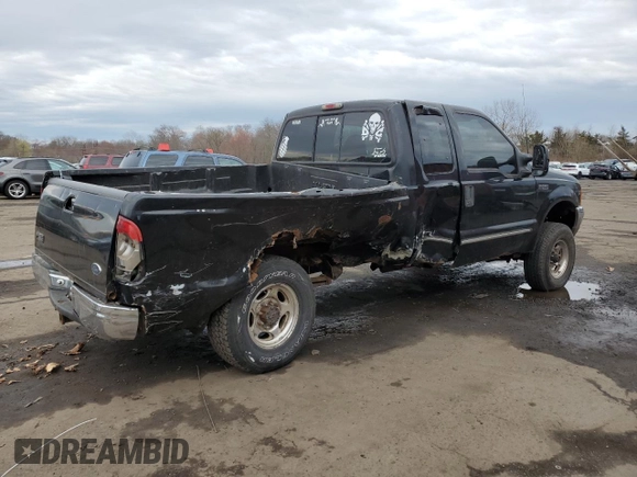 2000 Ford F-250 XL with VIN 1FTNX21L5YEC66604, listed as a Copart auction lot 51754055 with 167,798 mi miles and Salvage title. Bid and sale history available at DreamBid. Image 3.