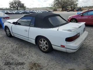 1993 Nissan 240SX SE Limited Edition z VIN JN3MS37AXPW202518, wystawiony jako Copart lot #51807405 z przebiegiem 260 905 mil mil oraz Szkody całkowita. Historia ofert i sprzedaży dostępna na DreamBid. Obrazek 2.