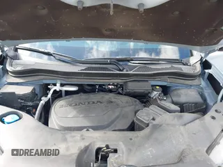 2023 Honda Passport Elite with VIN 5FNYF8H03PB000039, listed as a IAAI auction lot 40593339 with 33,697 mi miles and . Bid and sale history available at DreamBid. Image 10.