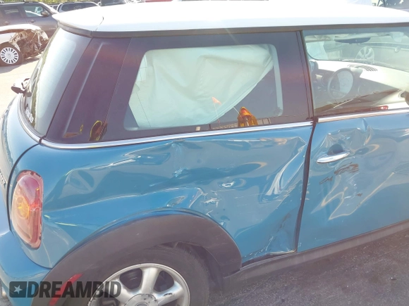 2008 MINI Hardtop with VIN WMWMF33568TT67727, listed as a IAAI auction lot 41985166 with 158,579 mi miles and . Bid and sale history available at DreamBid. Image 6.