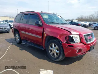 2005 GMC Envoy SLE with VIN 1GKDT13S252127604, listed as a IAAI auction lot 41898390 with 210,655 mi miles. Bid and sale history available at carsss.com. Image 6.
