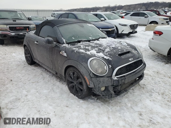 2013 MINI Roadster S z VIN WMWSY3C58DT566208, wystawiony jako Copart lot #41480595 z przebiegiem 119 265 mil mil oraz Szkody całkowita. Historia ofert i sprzedaży dostępna na DreamBid. Obrazek 4.