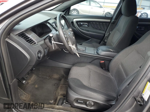 2014 Ford Taurus SEL z VIN 1FAHP2E80EG174910, wystawiony jako Copart lot #56070945 z przebiegiem 147 201 mil mil oraz Szkody całkowita. Historia ofert i sprzedaży dostępna na DreamBid. Obrazek 7.