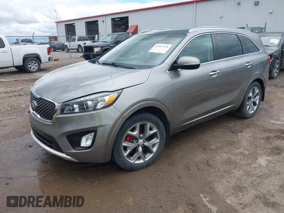 2017 Kia Sorento SXL z VIN 5XYPK4A59HG253995, wystawiony jako IAAI lot #42367134 z przebiegiem 118 084 mil mil oraz . Historia ofert i sprzedaży dostępna na DreamBid. Obrazek 2.