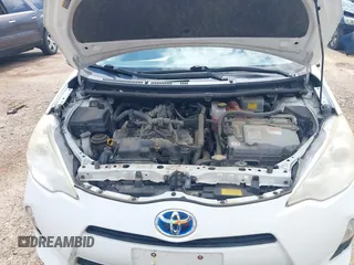 2012 Toyota Prius One z VIN JTDKDTB36C1009273, wystawiony jako IAAI lot #42454213 z przebiegiem 227 913 mil mil oraz . Historia ofert i sprzedaży dostępna na DreamBid. Obrazek 10.