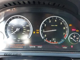 2012 BMW 7 Series 750Li xDrive with VIN WBAKC8C53CC435553, listed as a IAAI auction lot 41852097 with 127,418 mi miles and . Bid and sale history available at DreamBid. Image 7.