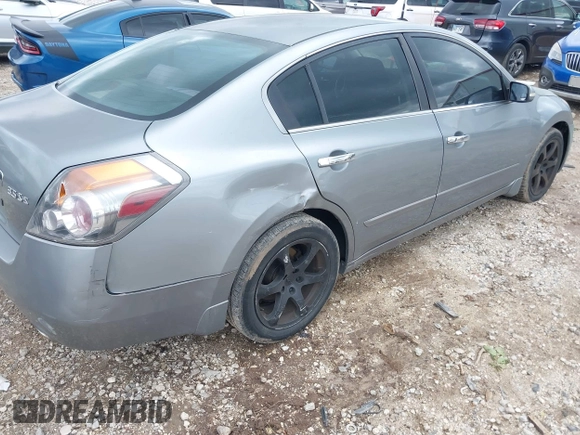 2008 Nissan Altima SE z VIN 1N4BL21E58C210986, wystawiony jako IAAI lot #42322119 z przebiegiem 154 546 mil mil oraz . Historia ofert i sprzedaży dostępna na DreamBid. Obrazek 6.