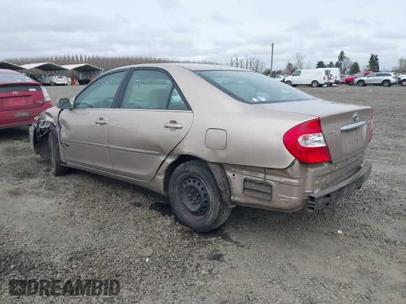 2002 Toyota Camry LE z VIN 4T1BE32K72U028489, wystawiony jako IAAI lot #41760604 z przebiegiem 163 950 mil mil oraz . Historia ofert i sprzedaży dostępna na DreamBid. Obrazek 3.