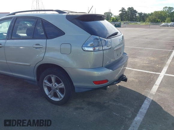 2006 Lexus RX 400h with VIN JTJHW31U360013349, listed as a IAAI auction lot 42614481 with 330,928 mi miles and . Bid and sale history available at DreamBid. Image 3.