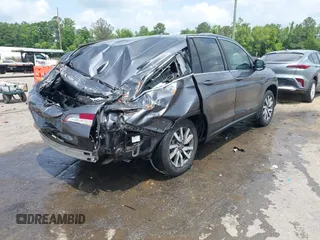 2019 Honda Pilot EX-L with VIN 5FNYF5H4XKB018306, listed as a IAAI auction lot 42441441 with 53,212 mi miles and . Bid and sale history available at DreamBid. Image 4.