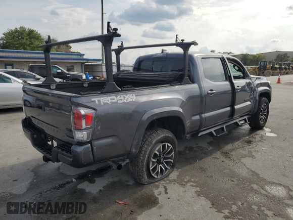 2020 Toyota Tacoma SR5 z VIN 3TYDZ5BN9LT000209, wystawiony jako Copart lot #56127875 z przebiegiem 92 350 mil mil oraz Szkoda całkowita • Salvage title. Historia ofert i sprzedaży dostępna na DreamBid. Obrazek 3.
