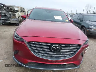 2021 Mazda CX-9 Signature with VIN JM3TCBEY0M0502938, listed as a IAAI auction lot 41734208 with 59,375 mi miles and . Bid and sale history available at carsss.com. Image 12.