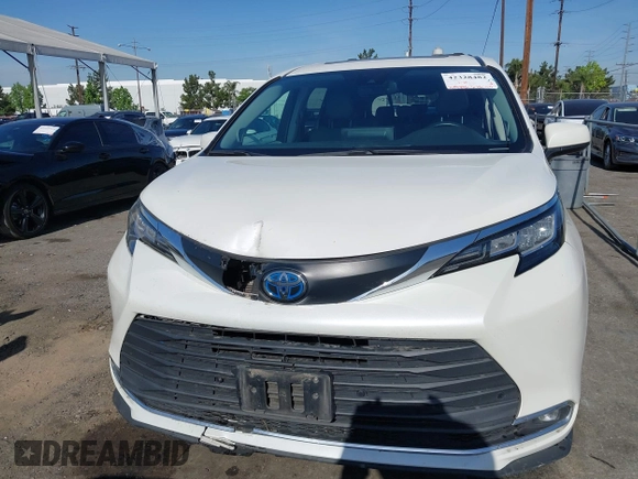 2021 Toyota Sienna XLE z VIN 5TDJRKEC7MS009306, wystawiony jako IAAI lot #42328482 z przebiegiem 169 443 mil mil oraz . Historia ofert i sprzedaży dostępna na DreamBid. Obrazek 12.