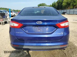 2013 Ford Fusion SE Hybrid z VIN 3FA6P0LU8DR295297, wystawiony jako Copart lot #61830065 z przebiegiem 190 096 mil mil oraz Czysty tytuł • Clean title. Historia ofert i sprzedaży dostępna na DreamBid. Obrazek 6.