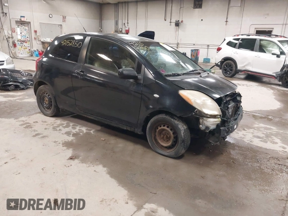 2008 Toyota Yaris with VIN JTDJT923285196299, listed as a IAAI auction lot 42152850 with 214,238 mi miles. Bid and sale history available at carsss.com. Image 1.
