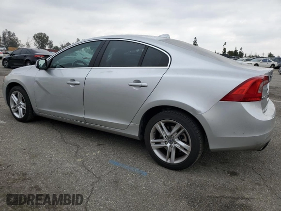 2014 Volvo S60 T5 with VIN YV1612FS4E1292856, listed as a Copart auction lot 50951795 with 121,283 mi miles and Salvage Title. Bid and sale history available at carsss.com. Image 2.