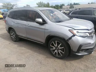 2022 Honda Pilot Touring 7-Passenger with VIN 5FNYF6H60NB013465, listed as a IAAI auction lot 40139627 with 78,161 mi miles. Bid and sale history available at carsss.com. Image 18.