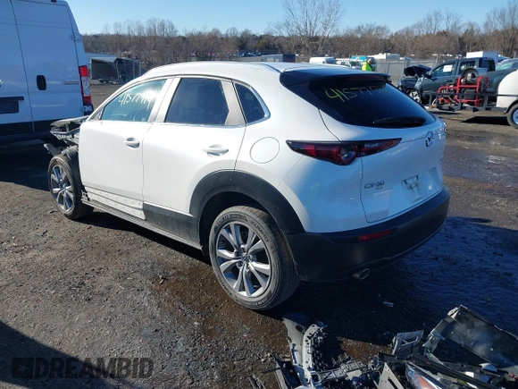 2022 Mazda CX-30 S Select z VIN 3MVDMBBL8NM448787, wystawiony jako IAAI lot #41577914 z przebiegiem 64 552 mil mil oraz . Historia ofert i sprzedaży dostępna na DreamBid. Obrazek 3.